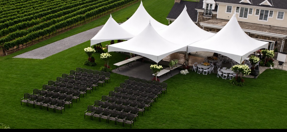 White frame tent rental installation for an event in Northport NY